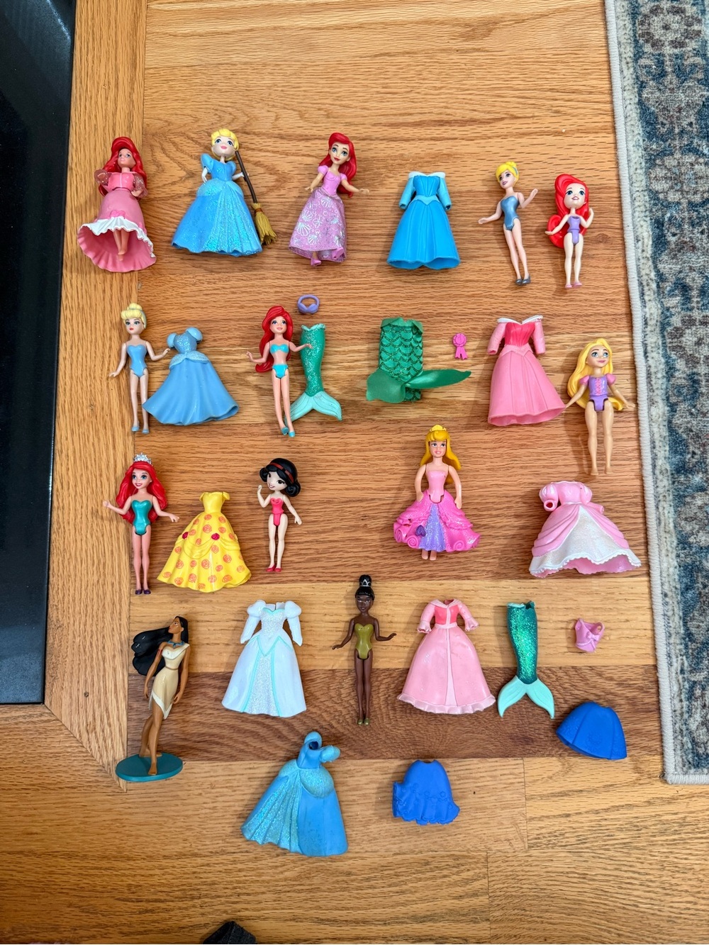Disney Princess Polly Pocket dolls and their  rubber "Magic Clip" dresses